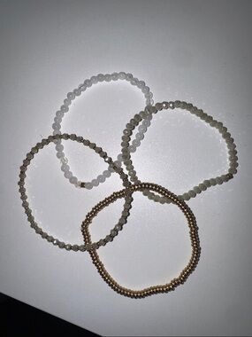 Set of Four Beaded Stretch Bracelets in White, Gray and Gold